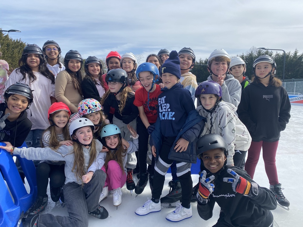 Kindergarten and Fifth Grade Students Embark on Their ‘Buddy Skate’